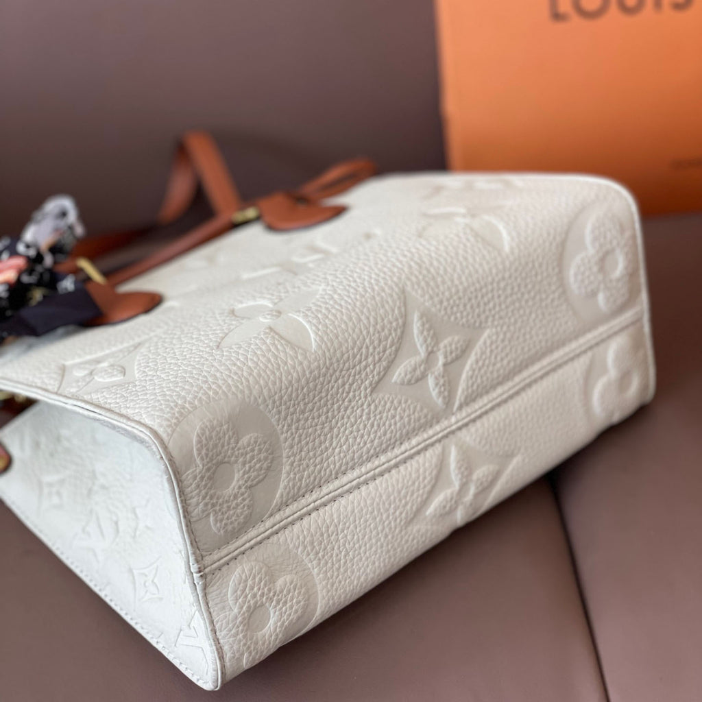 L Fashion Embossed Cowhide Bag XC24092411