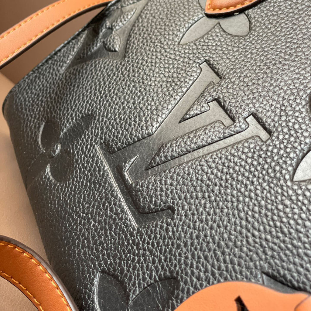 L Fashion Embossed Cowhide Bag XC24092411