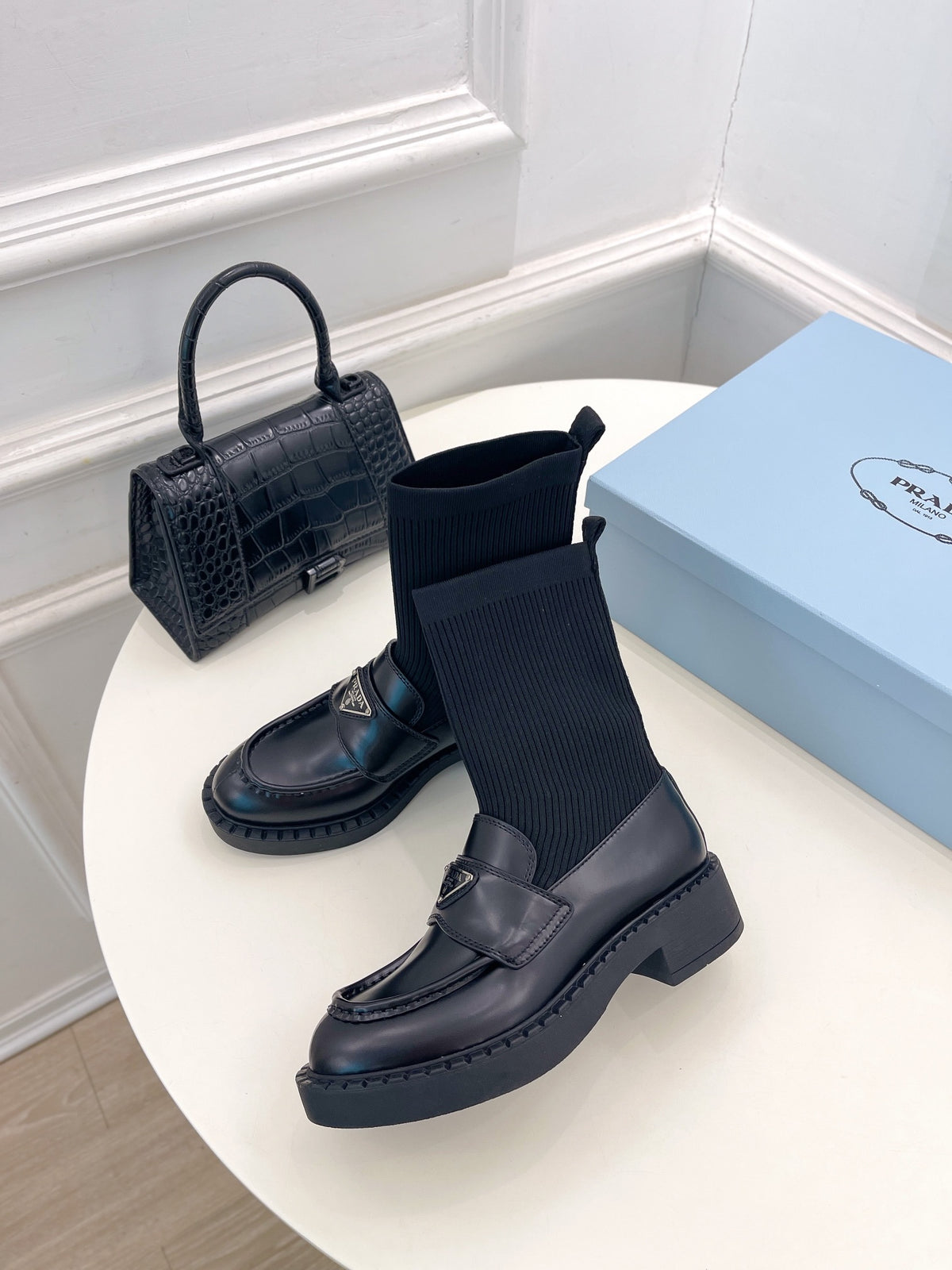 P thick-soled triangle logo socks ankle boots 0724112012
