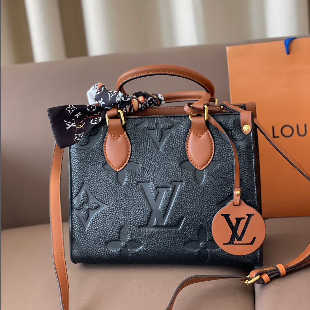 L Fashion Embossed Cowhide Bag XC24092411