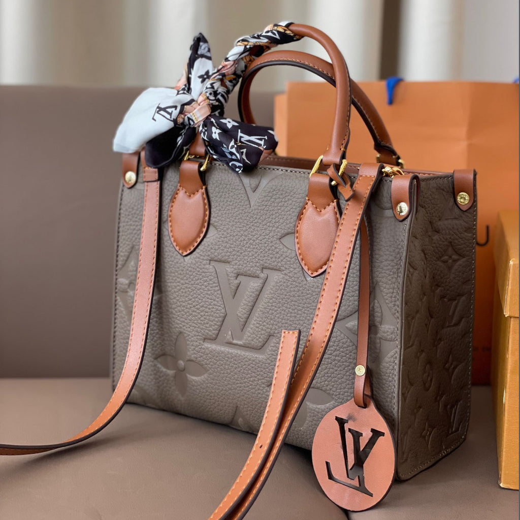 L Fashion Embossed Cowhide Bag XC24092411