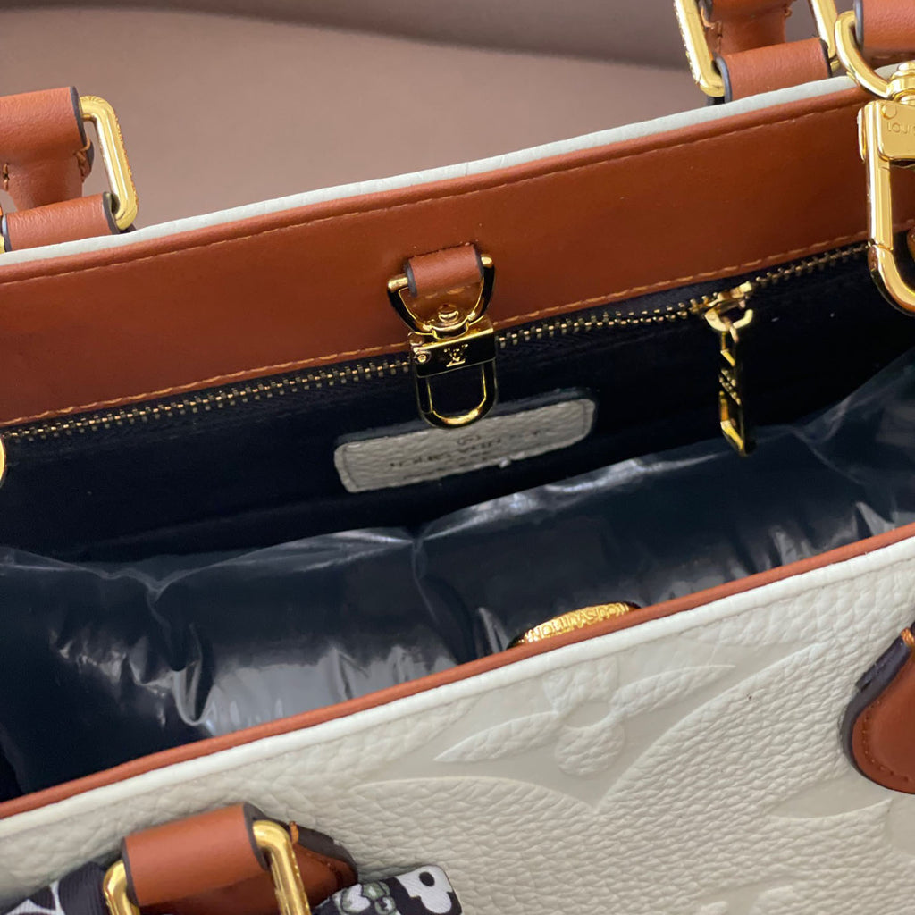 L Fashion Embossed Cowhide Bag XC24092411