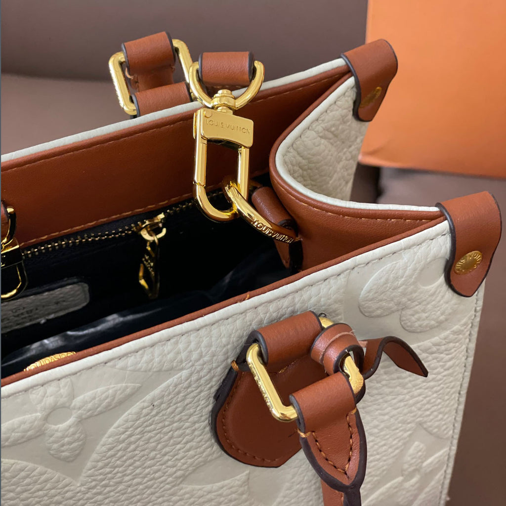 L Fashion Embossed Cowhide Bag XC24092411