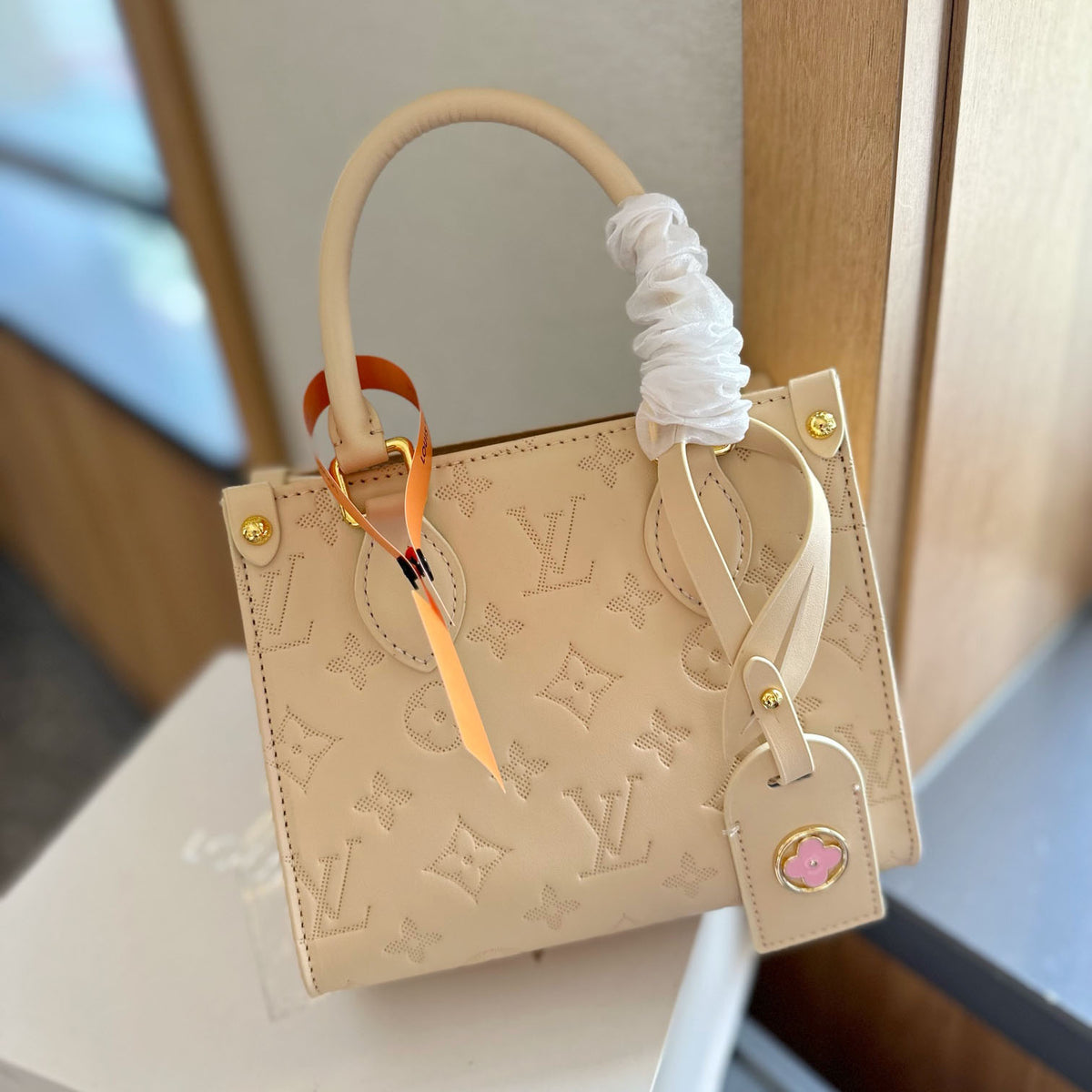 L OnTheGo Small Handbag XC24092429