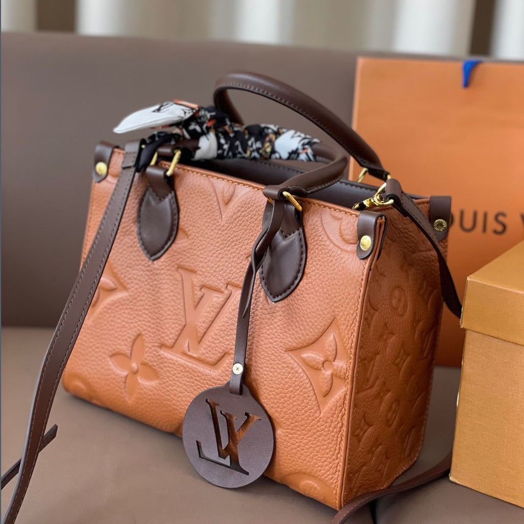 L Fashion Embossed Cowhide Bag XC24092411