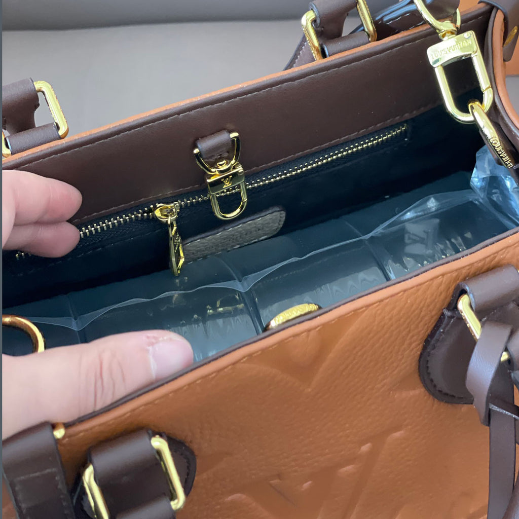 L Fashion Embossed Cowhide Bag XC24092411