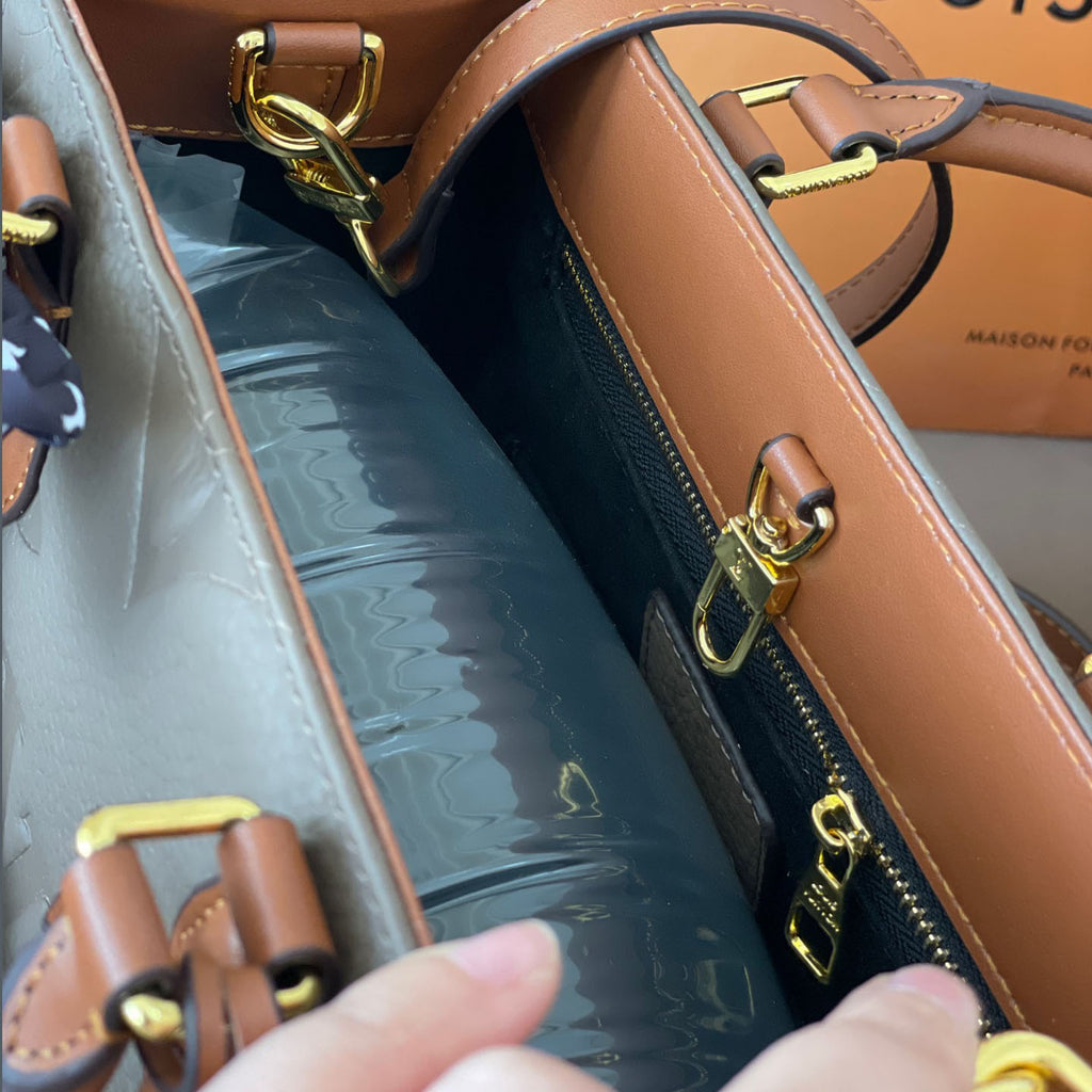 L Fashion Embossed Cowhide Bag XC24092411