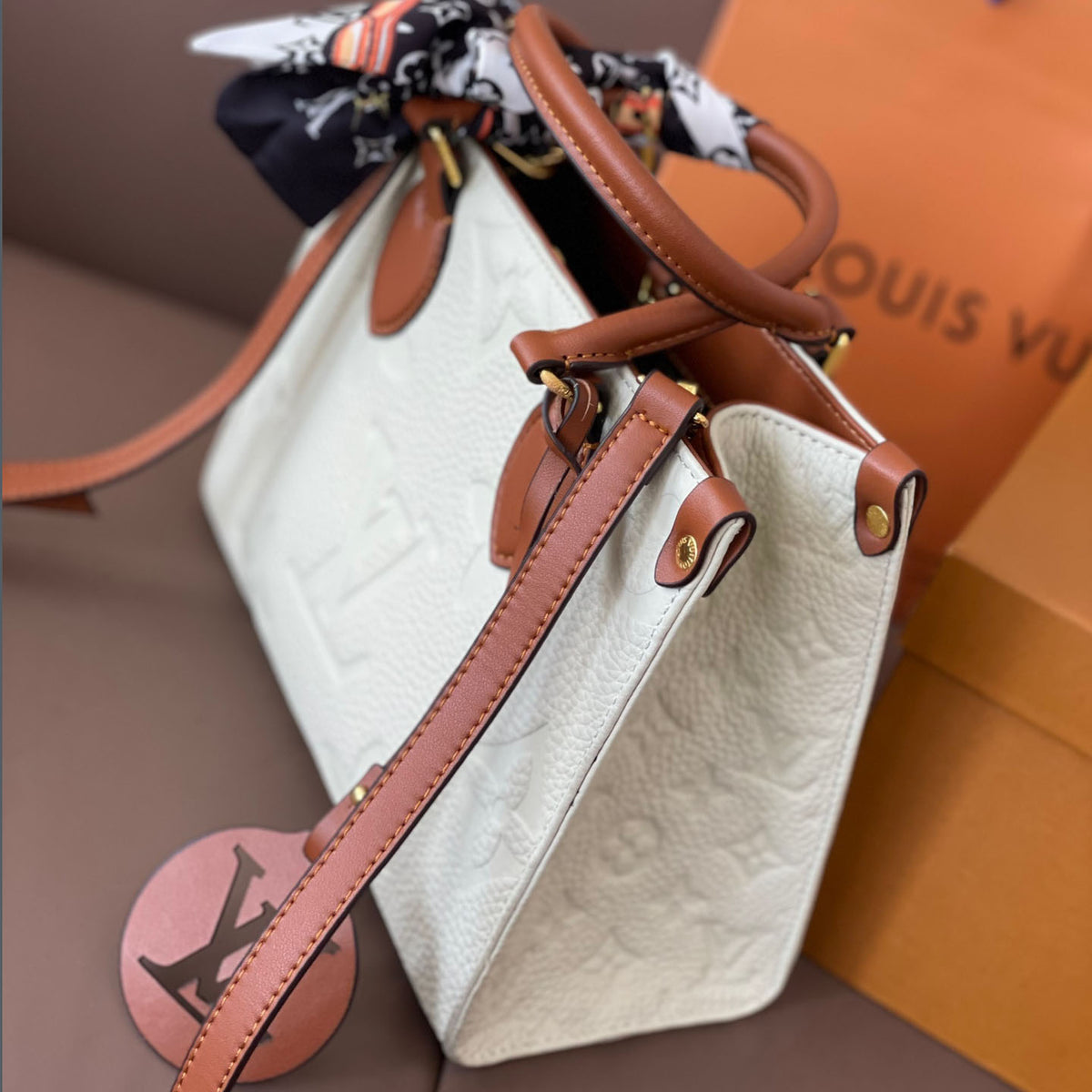 L Fashion Embossed Cowhide Bag XC24092411