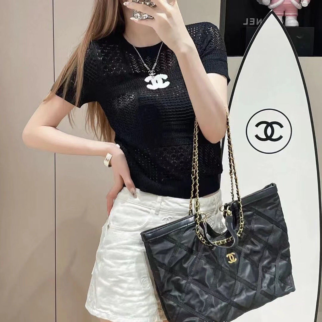 Summer new style hollow round neck knitted top 0724052203