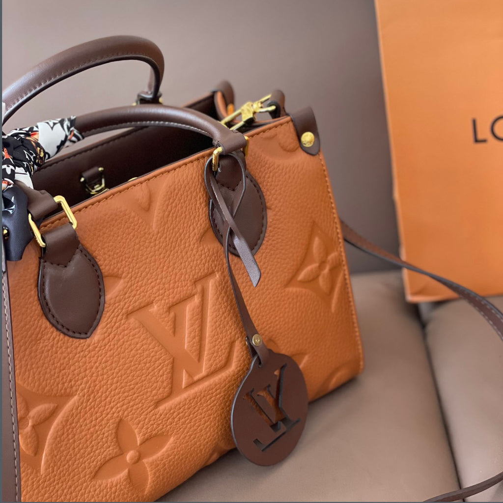 L Fashion Embossed Cowhide Bag XC24092411