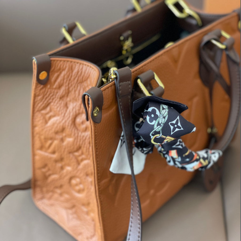 L Fashion Embossed Cowhide Bag XC24092411