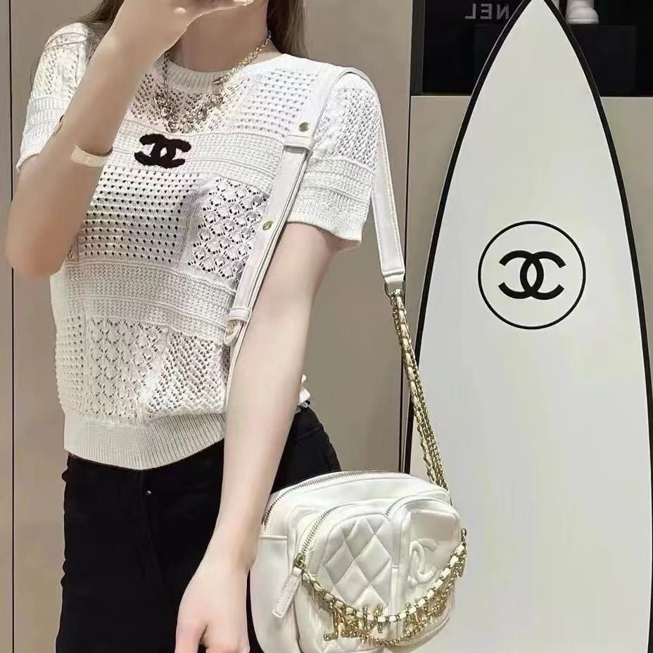 Summer new style hollow round neck knitted top 0724052203
