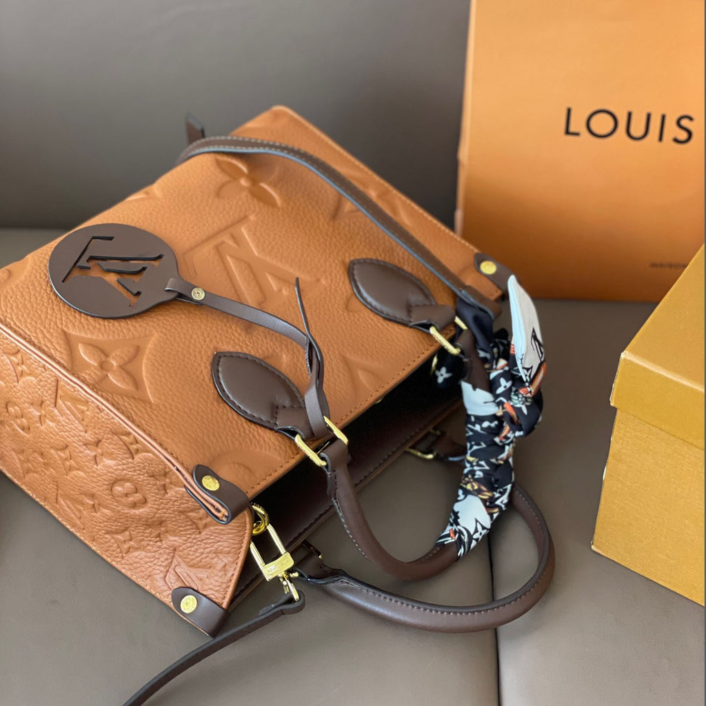 L Fashion Embossed Cowhide Bag XC24092411