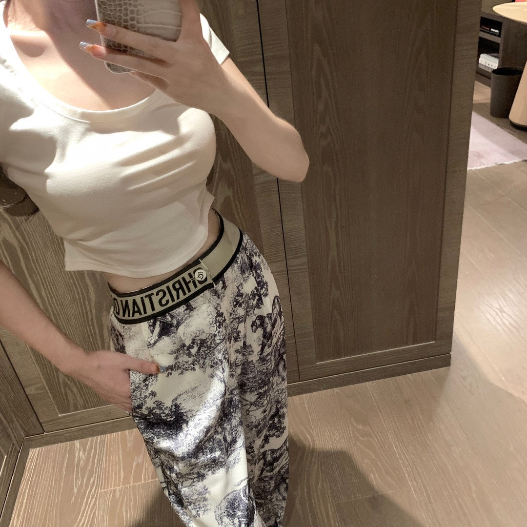 All-over animal and flower print custom letter button web casual trousers 1824042609