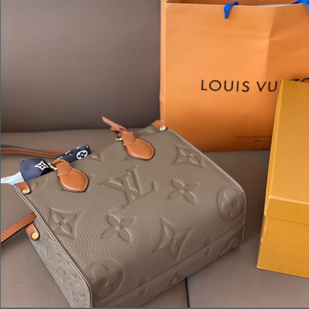 L Fashion Embossed Cowhide Bag XC24092411