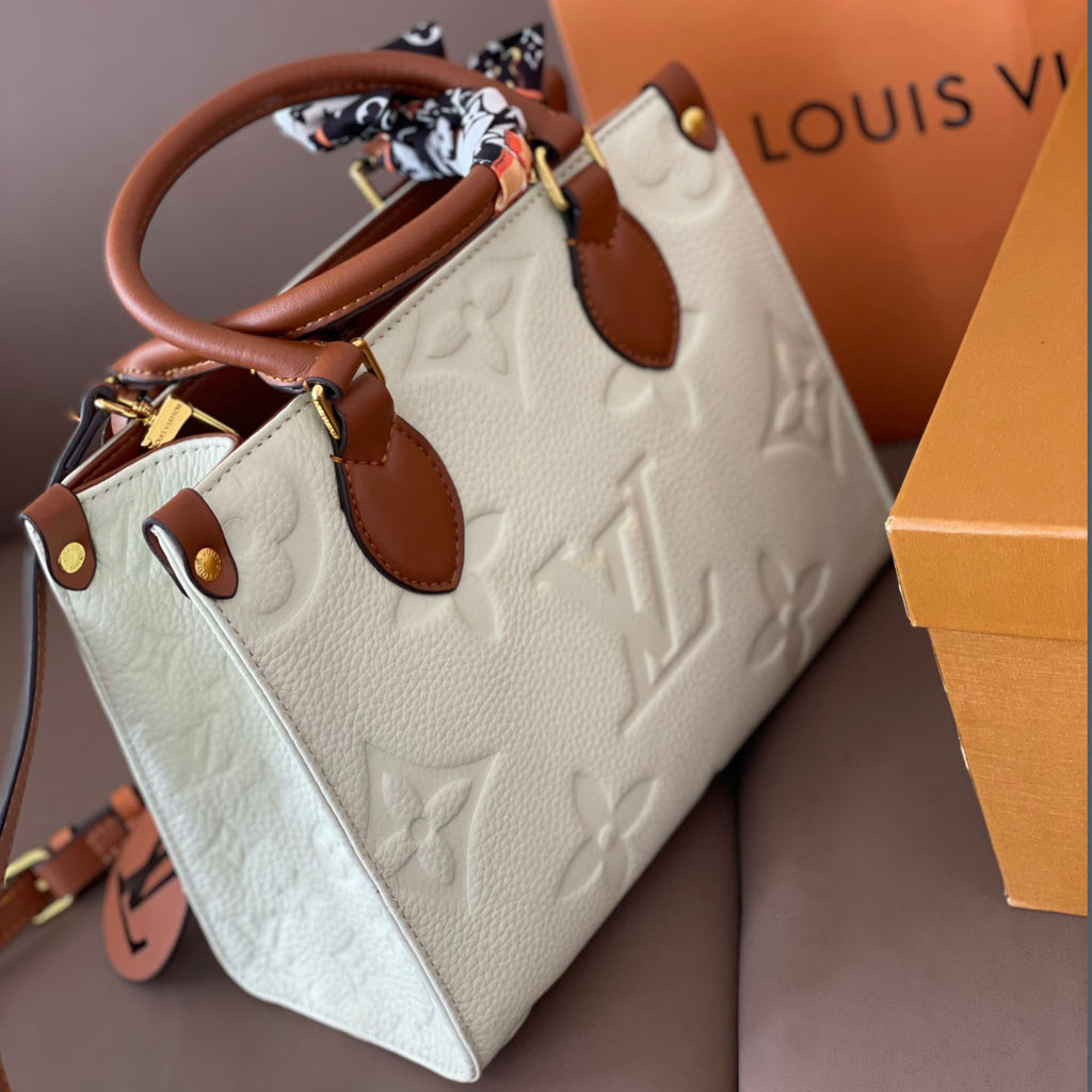 L Fashion Embossed Cowhide Bag XC24092411
